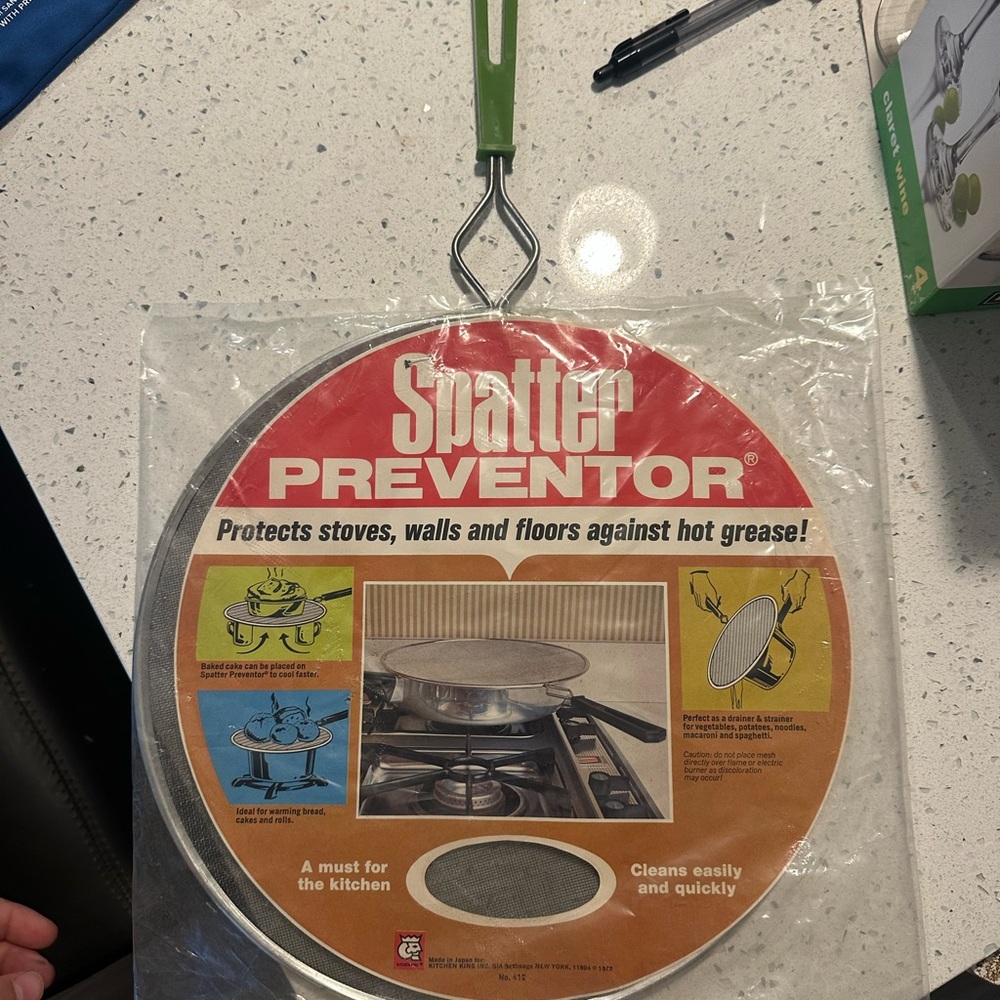 Spatter Preventor with Green Handle